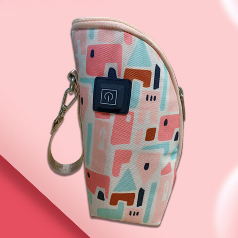 Nurtura – Warm & Onderweg – Draagbare Babyflessenwarmer