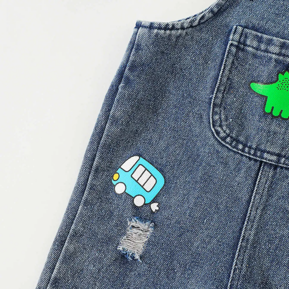 DinoDenim – Stoer & Speels – Kinder Tuinbroek met Cartoonprints